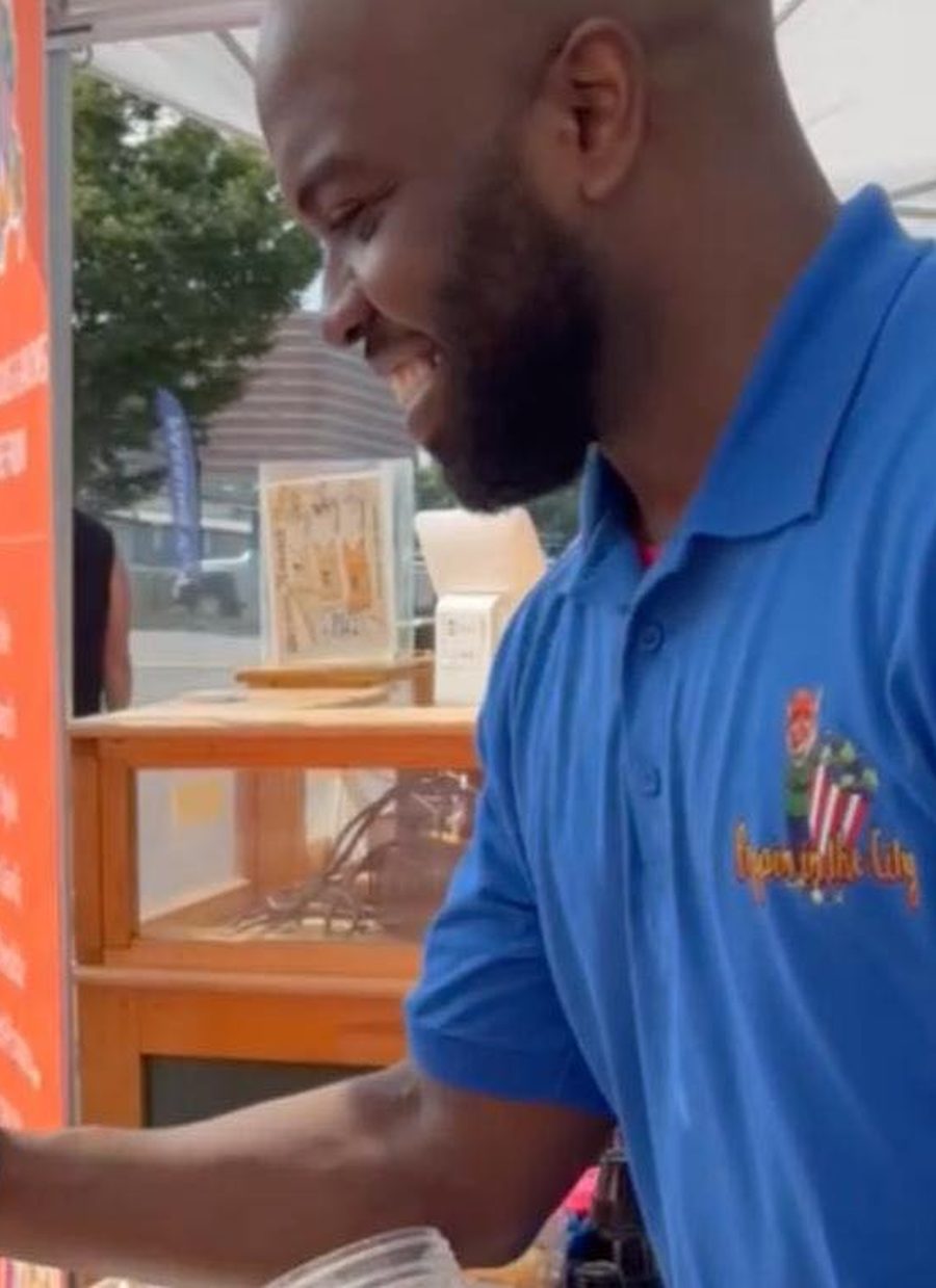 Poppin' in the City serving fresh popcorn at a local event